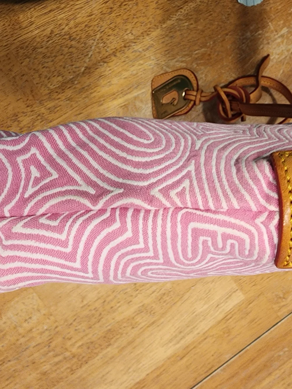 Dooney & Bourke pink doodle swirl canvas mini shoulder bag featuring tan leather